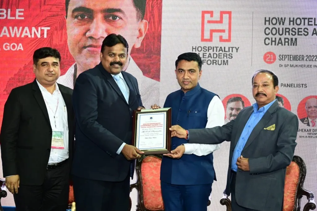 R. S. Dharmendra receiving the Young Achiever's Award from Hon'ble Dr. Pramod Sawant, Chief Minister of Goa, at the Indian Hospitality Leadership Awards